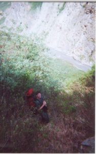 <b>All Smiles Despite The Brutal Terrain</b><br> BirdShooter descends to the Teklanika River via a steep and heavily wooded slope.