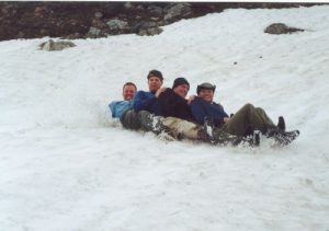 <b>Sled Riding The Thermarest On Day Three</b><br> Left to Right: Sikle, BirdShooter, C.A., The Joker