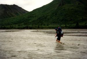 <b>Fording The East Fork Of The Toklat River</b><br> The Iceman wades across the Toklat River around 10pm on our first day on the trail.