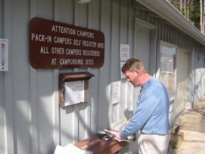 <b>Trailhead Registration</b><br> The Camel signs in at the Ranger Station and pays up - $9 for the night.
