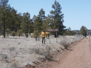 <b>The Continental Divide Trail marker</b><br> Mike at the intersection of County Road 12 and the Continental Divide Trail