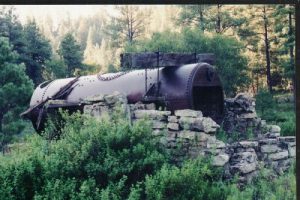 <b>Boiler Peak</b><br> This massive boiler, from which the peak gets its name, once ran a sawmill which provided lumber for mining operations in the area.