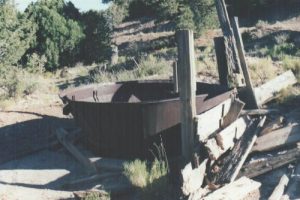 <b>Settling Tank</b><br> Part of the cyanide washing system at the old mine. About 500 feet above Rosedale, and was connected by a long wooden flume that carried the toxic mixture.