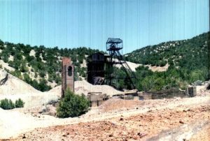 <b>Looking southeast</b><br> The Taylor Headframe sitting behind the old smelter. Head this direction to start you circle hike.