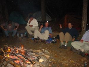 <b>Social Hour</b><br> The rest of the crew smoked some cigars and swapped some stories while we pitched our tents and cooked up a late dinner.