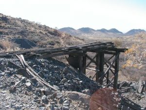 <b>Ore car dump.</b><br> The cars were run out onto these rails from the mine, and then dumped into the processing works below.