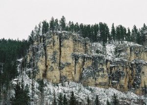 <b>Surrounding Cliffs</b><br> Here is just one of the surrounding limestone cliffs visible from the trail.