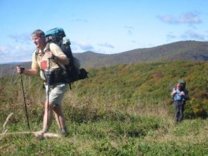 <b>Almost There</b><br> Black Crowe and The Camel hike the last few steps up Siler.