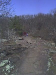 <b>Little Kennesaw Mountain</b><br> Looking north at hikers along the ridgeline of Little Kennesaw Mountain.