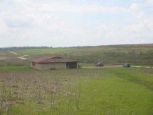 <b>Visitor's Center</b><br> View of the Visitor's Center from Drover's Trail looking to the south.