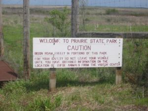 <b>Entrance To Prarie State Park</b><br> The park has a grate and fence to keep the Buffalo within the boundry of Prarie State Park.