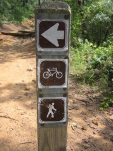 <b>Shared Route</b><br> Hikers and bikers share the Northshore Trail as in winds along the banks of Grapevine Lake.