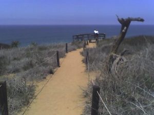 <b>Razor Point</b><br> The wood platform at Razor Point with two hikers enjoying the view.