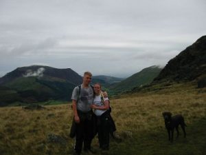 <b>Climbing Snowdon</b><br> The old lady and I climbing the back side Snowdon, the highest point in Wales. The ridge was tricky and at times only a foot or so wide with at least 50 foot drops on both sides. I say 50 feet because that's all the further we could see. It was a little more than disheartening when we reached the top to see a train pulling up from the other side.