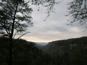 <b>View From Rattlesnake Point</b><br> We reached Rattlesnake Point about an hour before sunset with clouds still hovering over the ravine. By dusk, the sun started to penetrate the cloud cover, and we had stars throughout the night once the cold front pushed into the area.