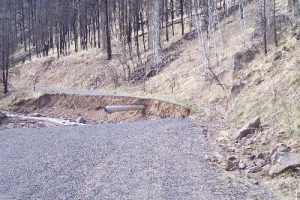 <b>The Incedible Disappearing Road</b><br> This is what happens when you have a forest fire, then torrential rains. It will be years before this is fixed.