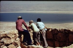 <b>A Grand View of the Dead Sea</b><br> Three Israeli youths enjoy the view from the top of Masada.