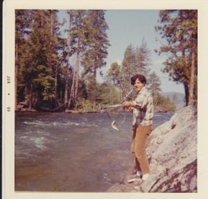 <b>Joe the Fisherman</b><br> Joe with a rainbow in the net at Rancheria Falls campsite.