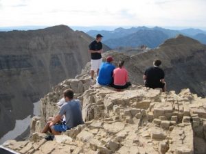 <b>Looking Down in all Directions</b><br> Hikers at the summit of Mt. Timpanogos -- 11753'.
