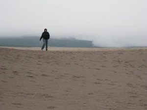 <b>Great Sand Dunes National Park</b><br> My wife, Debbi, just after crossing the dry bed of Medano Creek and starting up the first line of dunes. 10/22/10